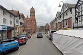 Child raced to hospital after 'falling from building' in busy town centre