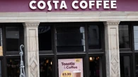 Three injured as car smashes into Costa Coffee with air ambulance deployed