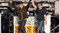 Liam and Noel hold hands on stage as Oasis fans go wild at first Manchester gig