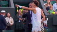 Wimbledon clash suspended with fuming star held back from umpire