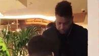 Moment Ronaldo staggers out of restaurant and is helped into car under sheet