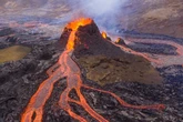 Drone films flight THROUGH erupting volcano as it spews lava