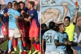Watch mass brawl break out in Atletico 2-1 win at Celta as Luis Suarez STAMPED ON