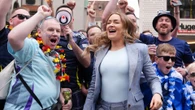 Woods shows off scar after horror injury as she parties with Scotland fans