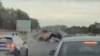 Moment trailer full of fridges crashes on M5 sending debris flying