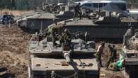 Israeli forces poised to pour into Lebanon as tanks mass & more troops called up