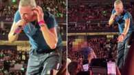 Watch the moment Coldplay's Chris Martin saves young fan from being crushed at gig