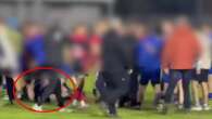 Moment kids' game explodes into chaos as youngsters 'stamp man on ground'