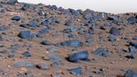 Remarkable images show eerie Mars view scattered with mysterious blue rocks