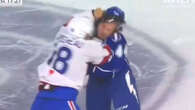 Moment hockey star snaps finger back into place after punching rival in head