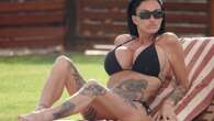 Katie Price strips to barely there bikini to show off huge tattoo collection