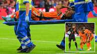 Nathan Ake looks on brink of tears as he's stretchered off with horror injury