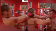 Watch moment fighters pummel each other inside phone box in bizarre sport