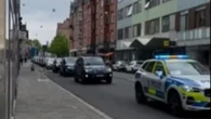 Moment ONE HUNDRED cops drive Israeli Eurovision star to show amid protest fear