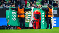 Medics rush to help and cover Nice star Sofiane Diop after terrifying injury