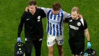 Matt O'Riley helped off by Brighton medics just NINE minutes into debut