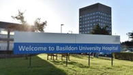 Masked knifeman on the loose after woman stabbed & robbed in hospital car park