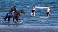 World's most unique racing meet - where sunbathers and horses share beach