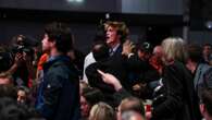 Moment protester put in headlock & dragged from conference after heckling Reeves