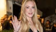 Lindsay Lohan looks incredible on the red carpet at Netflix movie premiere