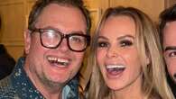 Amanda Holden flashes her legs in short dress at boozy Xmas bash with Alan Carr