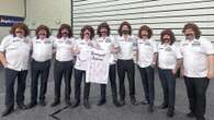 Darts stars all dress up as cult hero 'Bronzed Adonis'.. how many can you name?