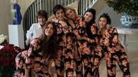 The Kardashian sisters wear matching pyjamas to celebrate mom Kris's 69th