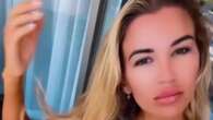 Christine McGuinness wears nothing but a thong as she strips topless in video