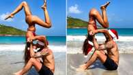 Izabel Goulart and footballer boyfriend show off beach yoga skills on holiday