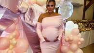 Pregnant Georgia Kousoulou shows off her huge bump in pink dress at baby shower