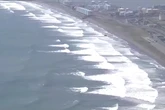 Ondas agitadas e pessoas em telhados: veja imagens do tsunami no Japão