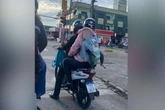 Flagrante: garupa de motocicleta faz bebê de mochila em SC