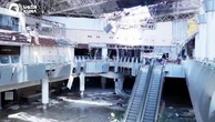 Nell'aeroporto del Kuwait devastato dal raid notturno: il bilancio è di un morto e decine di feriti