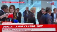 Sarkozy condannato assediato dai giornalisti, Carla Bruni stacca la spugna a un microfono per stizza