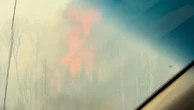 Canada, Manitoba brucia: l'automobilista attraversa i boschi in fiamme