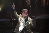 Elton John says ‘we will not back down’ in awards speech addressing AI concerns