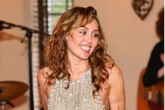 Miley Cyrus clarifies why she won’t be going on tour soon