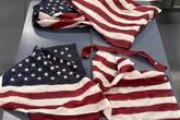 Flags torn from bridge honoring Afghan war hero after Trump’s order