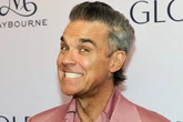 Robbie Williams says his very lucrative art takes ‘25 minutes to draw’