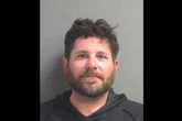 Man accused of pointing gun at kids for making waves near his boat