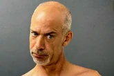 Man in Speedo attacks 911 dispatchers after breaking into office