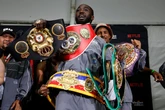 Boxing champion ordered out of car at gunpoint during police stop