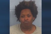 Woman arrested after dumping a dead baby inside a hearse, cops say