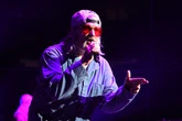 Fred Durst smacks down fan’s drone during Limp Bizkit show