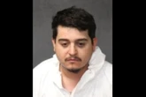 Man shot and killed two workers at auto parts store over oil, cops say