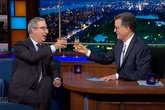 Stephen Colbert and John Oliver make a toast to late-night shows