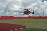 Texas coach injured by gunfire that crossed into baseball diamond