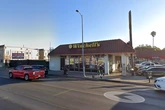 Armed man dressed in bikini storms LA donut shop