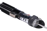 Darth Vader’s iconic light saber goes to auction for staggering amount