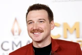Morgan Wallen skips ACM Awards and posts photo with NFL legend instead